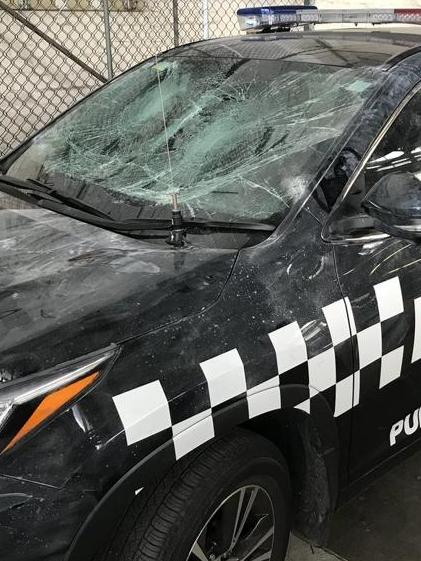 Police cars were smashed at an out-of-control party in North Melbourne. Picture: Paul Dowsley, Channel 7