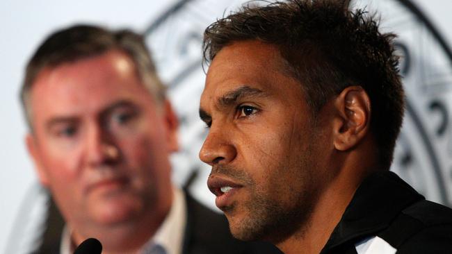 Andrew Krakouer, pictured with former Collingwood president Eddie McGuire, has revealed his story of racism at the Pies.