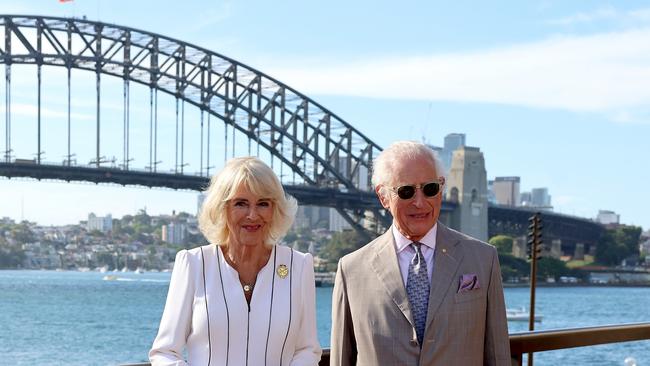 SYDNEY, AUSTRALIA - OCTOBER 22: King Charles III and Queen Camilla pose for a photo in front of Sydney Harbour Bridge on October 22, 2024 in Sydney, Australia. The King's visit to Australia is his first as monarch, and the Commonwealth Heads of Government Meeting (CHOGM) in Samoa will be his first as head of the Commonwealth. (Photo by Chris Jackson/Getty Images)