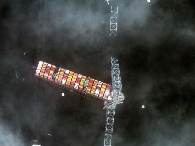 The ship smashed into the bridge’s support column. Picture: Maxar Technologies/AFP