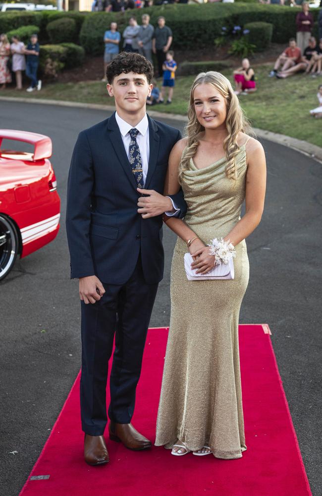 Graduate Fletcher Carlish and partner Brianna Kowitz arrive at Mary MacKillop Catholic College formal at Highfields Cultural Centre, Thursday, November 14, 2024. Picture: Kevin Farmer