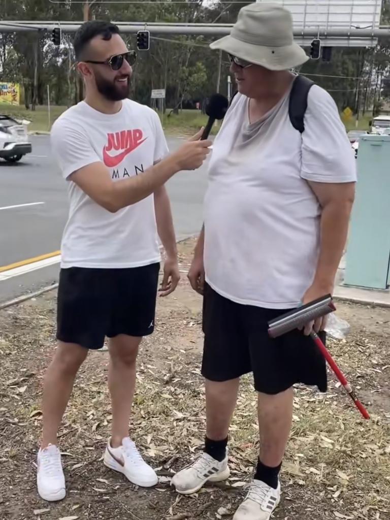 This man said he makes $150 in two hours washing car windows at a Sydney intersection. Picture: TikTok/@mahmoudismail9736