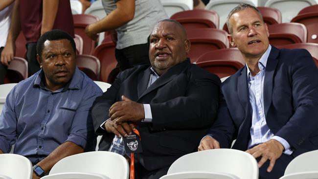 The team behind Papua New Guinea’s NRL expansion bid (from left) Sandis Tsaka, Stanley Hondina and Andrew Hill at the Manly v Parramatta game at Brookvale. Picture: Jonathan Ng