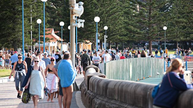 Large crowds exercising at Coogee Beach this morning. Picture: Adam Yip