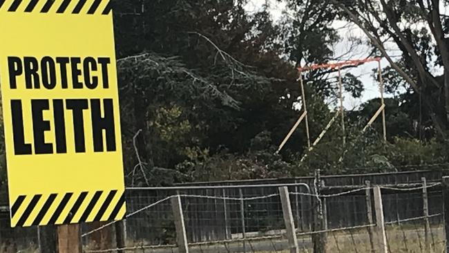 Signs at Leith as locals protest against plans for a highway flyover