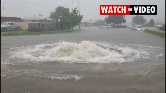 Palmerston streets flooded by heavy storm rains