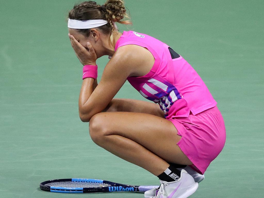 Serena Williams throws her racket after losing the second set tiebreak to  Victoria Azarenka of Belarus in the Woman's Final in Arthur Ashe Stadium at  the U.S. Open Tennis Championships at the