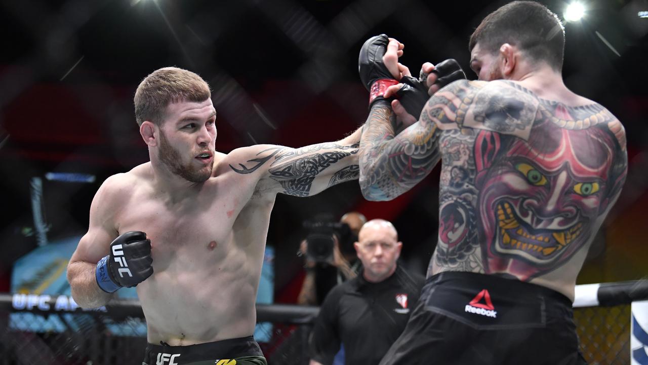 Jake Matthews (left) of Australia seen in his defeat to Sean Brady during the UFC 259 event at UFC APEX on March 06, 2021 in Las Vegas, Nevada. (Photo by Chris Unger/Zuffa LLC)