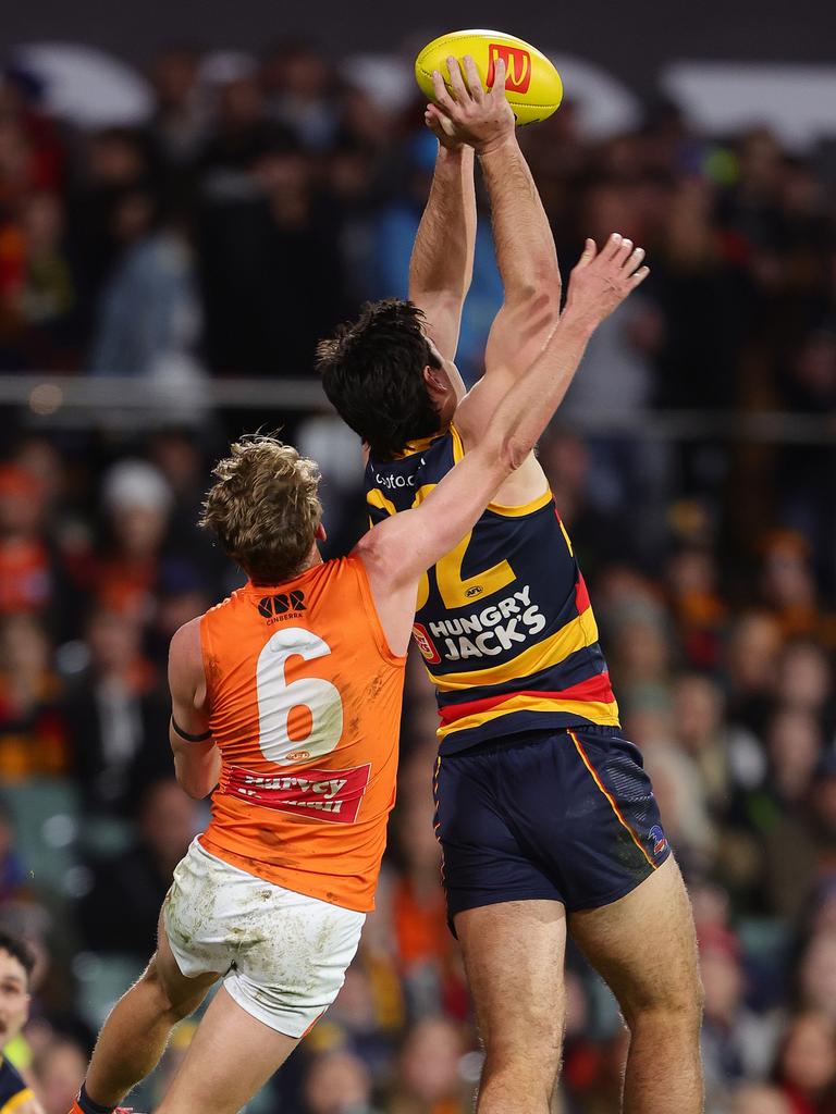 And takes a contested mark against the Giants. Picture: Sarah Reed/AFL Photos