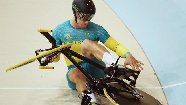 Matthew Glaetzer on the ground after falling from his bike in the velodrome.