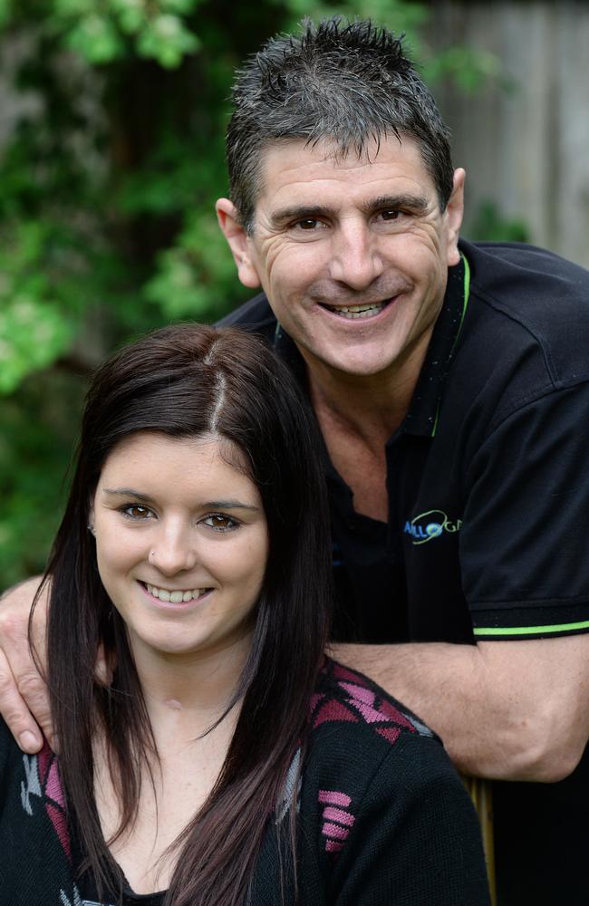 Monique Kouvaras and her father, Maurie. She spent months in hospital with devastating injuries and had to relearn how to read, write and talk. Picture: Steve Tanner