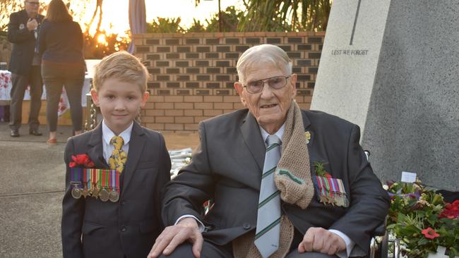 World War II Veteran Adrian Nall, 102, with his great grandson Max Mullins, 5. Kawana dawn service, Anzac Day, 2024. Picture: Madeline Grace