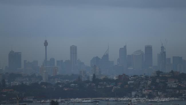 A week of rain was signalled by grey weather in Sydney on Sunday. Picture: John Grainger