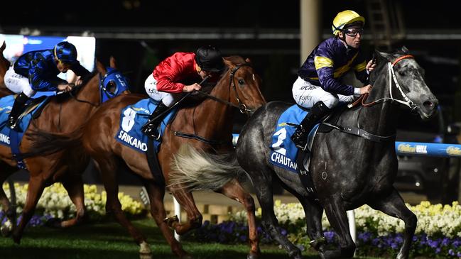 Tommy Berry rides Chautauqua to victory in the 2015 Manikato Stakes at The Valley. Picture: AAP Image/Julian Smith