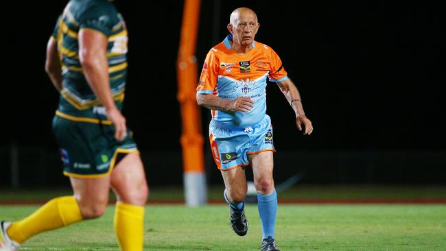 Cairns Mayor Bob Manning has a run in the Legends of League rugby league match between the Australian Team of NRL Legends and the FNQ All Stars in 2019. Picture: Brendan Radke