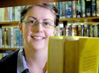 Assistant at the Richmond Upper Clarence Regional Library Richmond Branch, Kate Warner, with a selection of her favourite books. . Picture: Jay Cronan