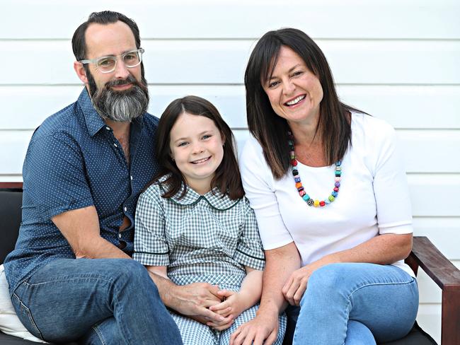 Mark Nielsen and Yvette Miller couldn’t be prouder of their daughter Harper, 9, who refuses to sing the national anthem. Picture: Annette Dew