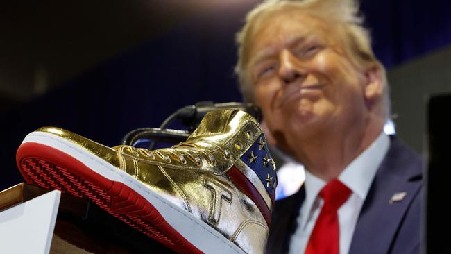 The spray-painted shoes are described as ‘bold, gold and tough, just like President Trump’, a website set up to sell the shoes said. Picture: Getty Images via AFP