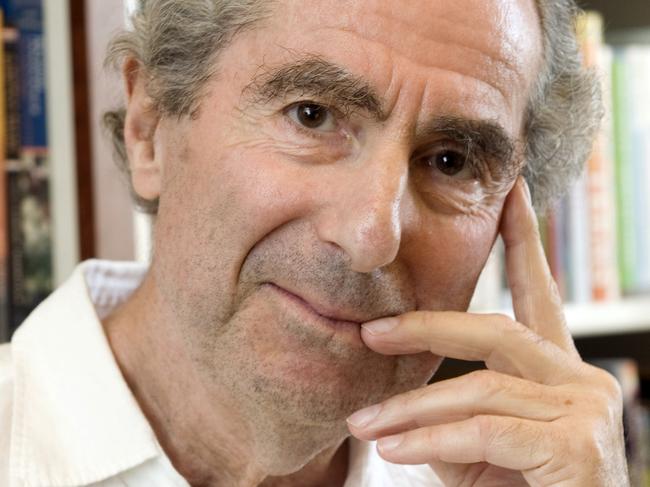 FILE - In this Sept. 8, 2008, file photo, author Philip Roth poses for a photo in the offices of his publisher, Houghton Mifflin, in New York. Roth, prize-winning novelist and fearless narrator of sex, religion and mortality, has died at age 85, his literary agent said Tuesday, May 22, 2018. (AP Photo/Richard Drew, File)