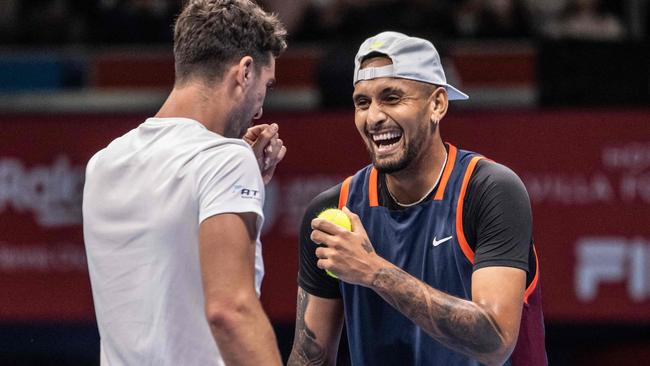 Nick Kyrgios and Thanasi Kokkinakis. Photo by Yuichi YAMAZAKI / AFP.