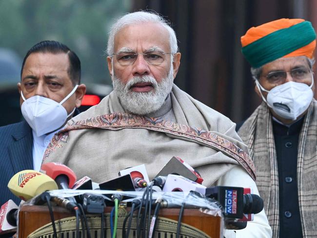 India's Prime Minister Narendra Modi (C) addresses the media at the Parliament during the opening of the budget session in New Delhi on January 31, 2022. (Photo by Prakash SINGH / AFP)