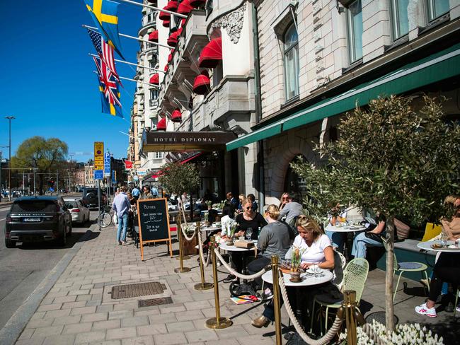 People have lunch at a restaurant in Stockholm, during the coronavirus COVID-19 pandemic. Picture: AFP