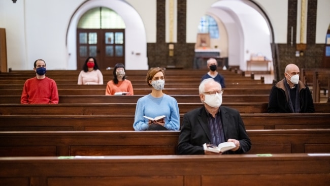 A West Australian Catholic church was interrupted by a police officer who had received reports people were not wearing their masks. Picture: Getty Images