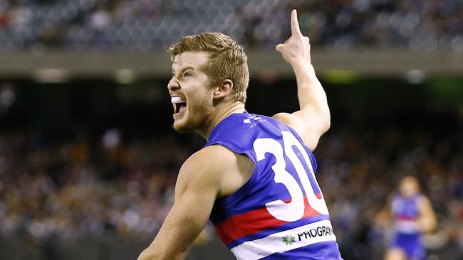 Christian Howard celebrates a goal for the Western Bulldogs. Picture: Wayne Ludbey