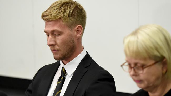 Richmond player Nathan Broad and Club President Peggy O’Neal read statements to the media at Punt Road Oval. Picture: Kylie Else