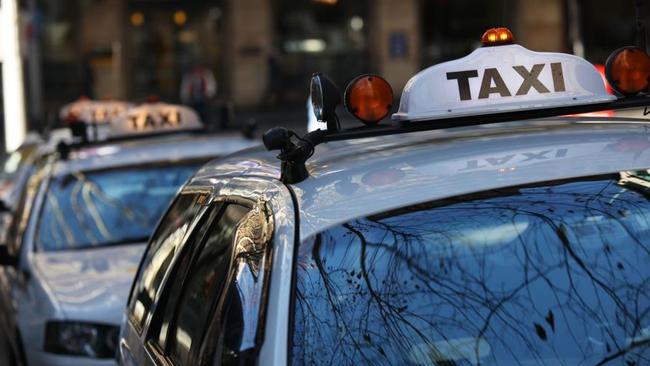 Taxis wait for fares at a rank in Sydney. Picture: AAP