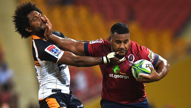 Reds gun Taniela Tupou gives Henry Speight a palm in the face last season. Picture: AAP Image/Dan Peled