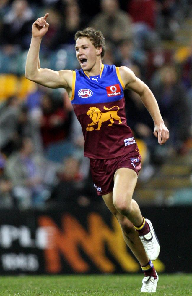 Jack Redden celebrates kicking a goal.