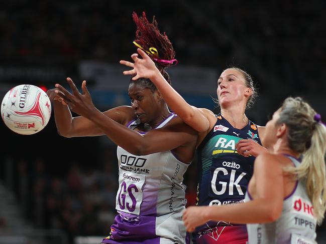 MELBOURNE, AUSTRALIA - APRIL 27: Emily Mannix of the Vixens and Romelda Aiken of the Firebirds compete for the ball during Super Netball round 1 match between the Vixens and Firebirds at Melbourne Arena on April 27, 2019 in Melbourne, Australia. (Photo by Scott Barbour/Getty Images)