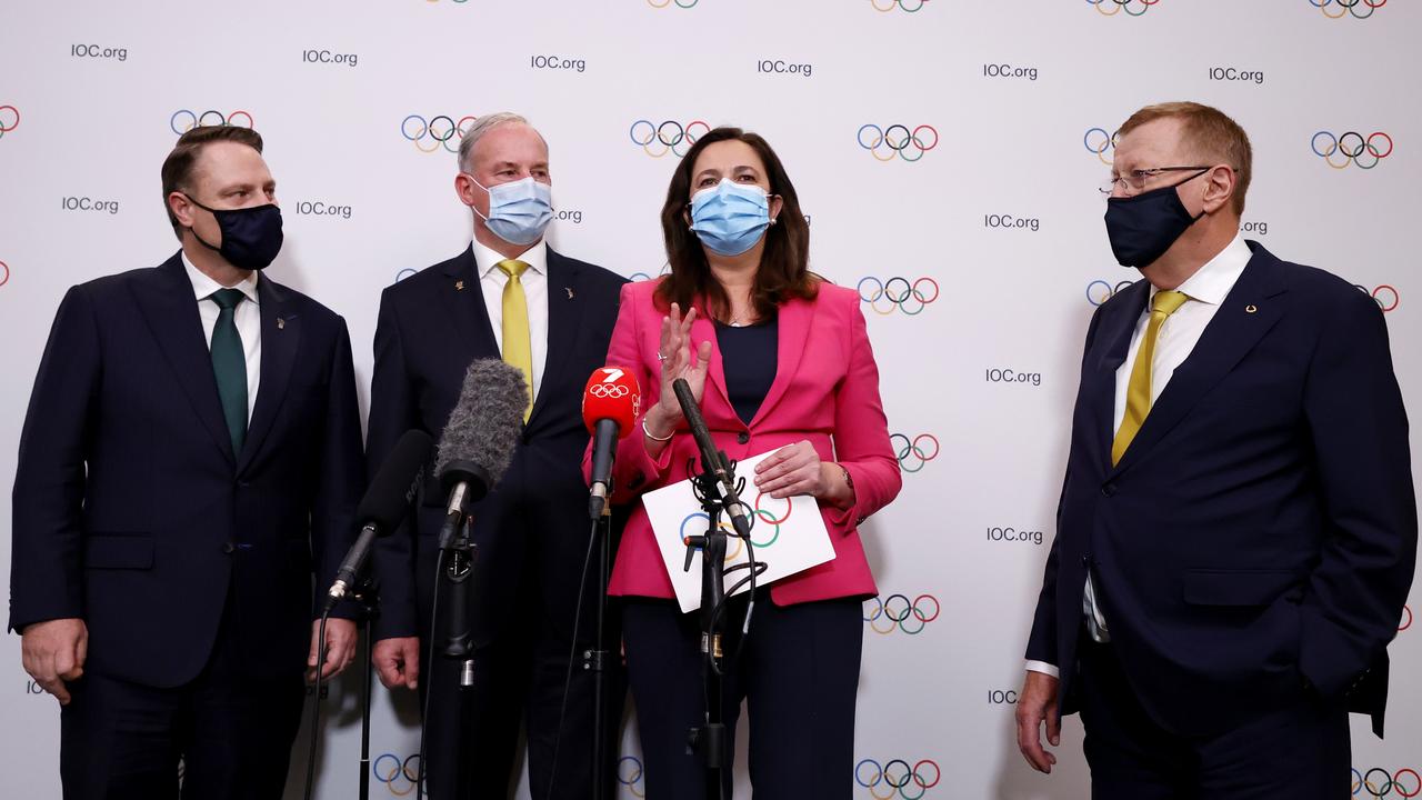 Annastacia Palaszczuk and John Coates (right) speak to the media after Brisbane was announced as the 2032 Summer Olympics host city on Wednesday in Japan. Photo: Toru Hanai/Getty Images