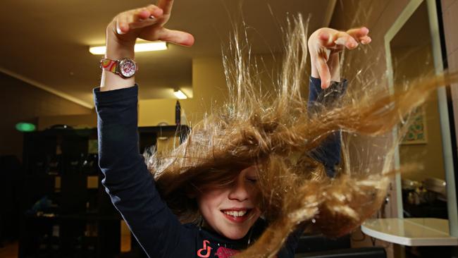 Georgia Fenwick (9) before she chops off 14 inch of hair for Kids for Wigs fundraiser at studio hair and Make up in Killarney Heights. Adam Yip/ Manly Daily