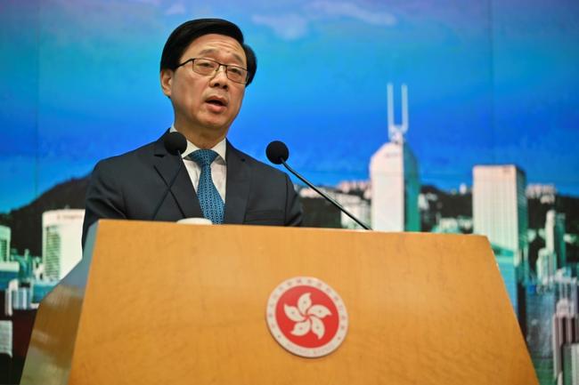 Hong Kong Chief Executive John Lee has warned eight wanted activists they'll 'spend their days in fear' if they fail to turn themselves in