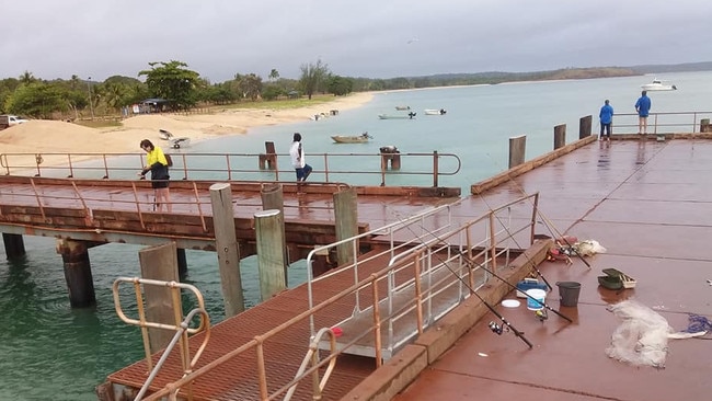 Fishing is a popular past time at the Seisia wharf where a child was attacked by a grouper last week. Picture: MICHAEL NAMOCK