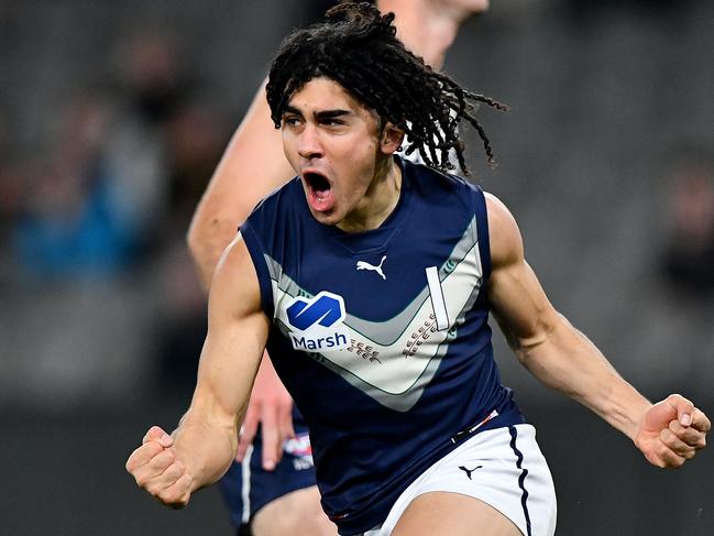 MELBOURNE, AUSTRALIA - JULY 14: Isaac Kako of Victoria Metro celebrates kicking a goal during the 2024 Marsh AFL Championships U18 Boys match between Victoria Metro and Victoria Country at Marvel Stadium on July 14, 2024 in Melbourne, Australia. (Photo by Josh Chadwick/AFL Photos)