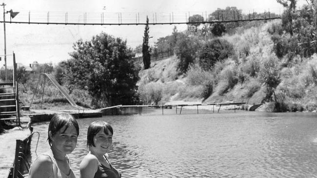 Kathy Barker and Kathy Adams, both 14, at the Gilberton Swimming Pool under the iconic swing bridge, January 1967. Picture: Jack Hayhurst