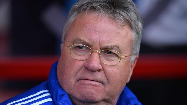 Chelsea's Dutch interim manager Guus Hiddink arrives ahead of the English Premier League football match between Bournemouth and Chelsea at the Vitality Stadium in Bournemouth, southern England on April 23, 2016. / AFP PHOTO / GLYN KIRK / RESTRICTED TO EDITORIAL USE. No use with unauthorized audio, video, data, fixture lists, club/league logos or 'live' services. Online in-match use limited to 75 images, no video emulation. No use in betting, games or single club/league/player publications.  /