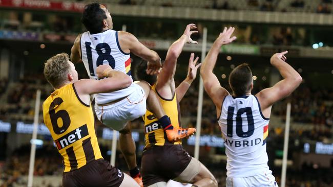 Eddie Betts flies for a screamer but can't hang on to the ball. Picture: Michael Klein