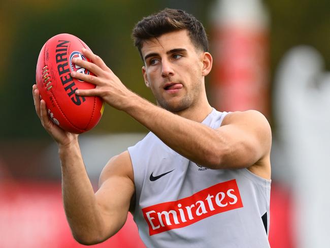MELBOURNE, AUSTRALIA - JUNE 03: Nick Daicos of the Magpies marks during a Collingwood Magpies AFL training session at Olympic Park Oval on June 03, 2025 in Melbourne, Australia. (Photo by Quinn Rooney/Getty Images)