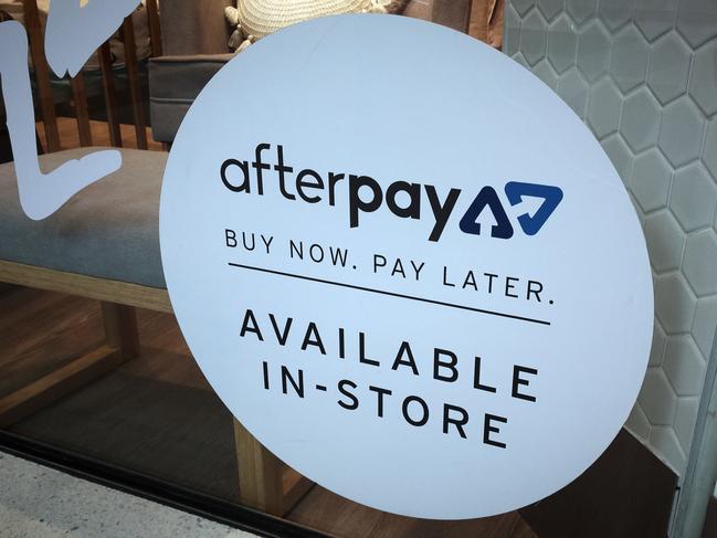 An Afterpay sign is seen in a store window in a shopping centre in Sydney, Tuesday, February 26, 2019. (AAP Image/Derek Rose) NO ARCHIVING