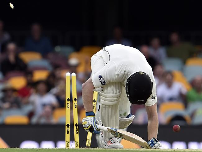 Mitchell Starc rattles James Neesham’s castle at the Gabba.