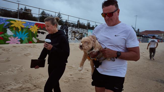 Bondi promenade covered in sand after severe weather hit Sydney. Picture: NewsWire / Flavio Brancaleone