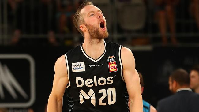 Dave Barlow celebrates a three-pointer against New Zealand.