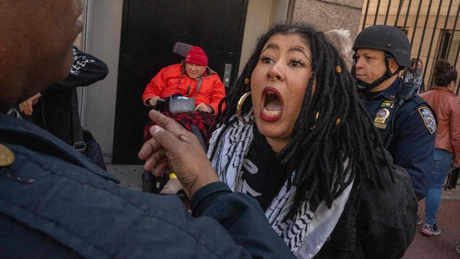 A Pro-Palestine protester is arrested at the gates of Columbia University on Monday in New York City. Picture: AFP