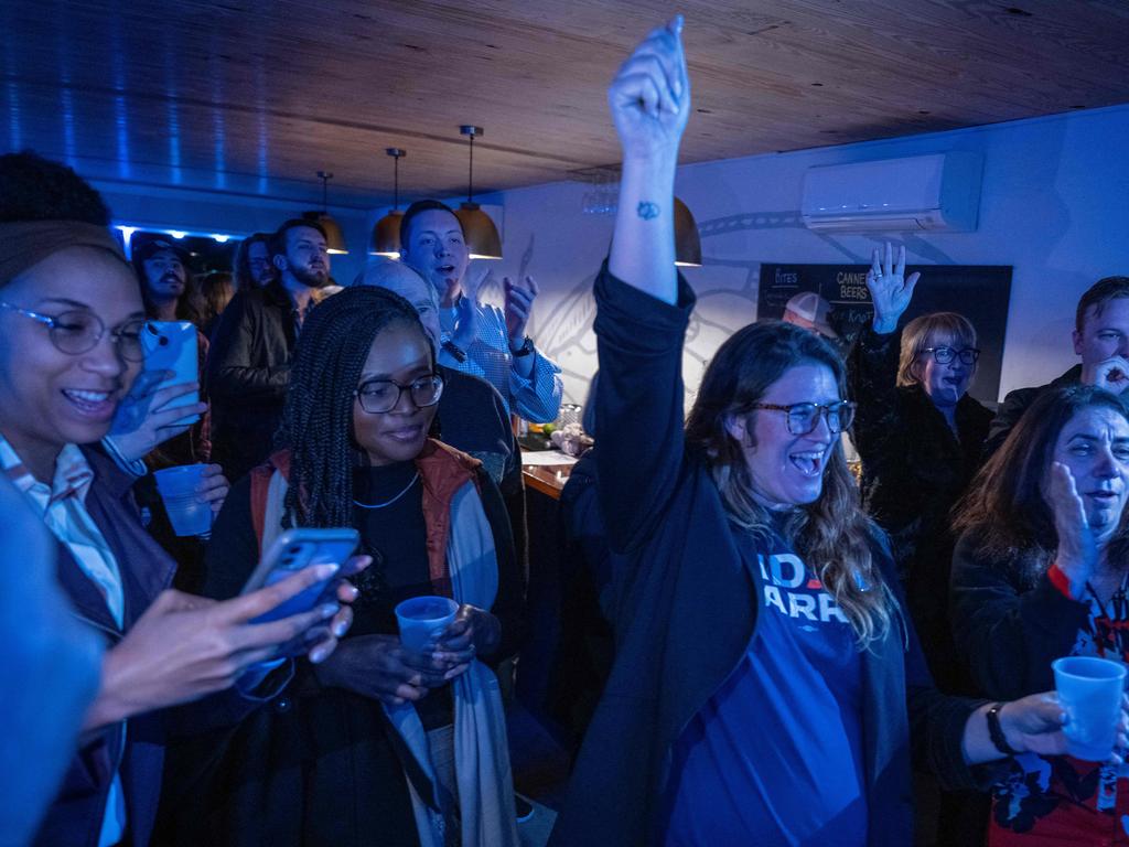 US President Joe Biden campaign volunteers celebrate during a campaign watch party in North Charleston, South Carolina. Picture: AFP