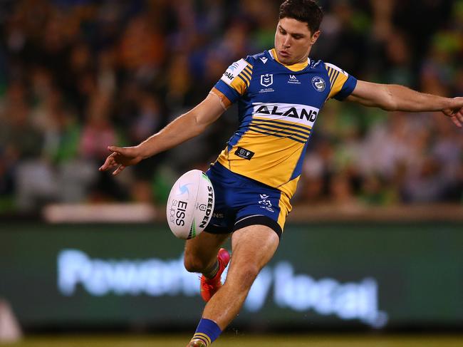 CANBERRA, AUSTRALIA - APRIL 17:  Mitchell Moses of the Eels kicks the ball during the round six NRL match between the Canberra Raiders and the Parramatta Eels at GIO Stadium on April 17, 2021, in Canberra, Australia. (Photo by Matt Blyth/Getty Images)