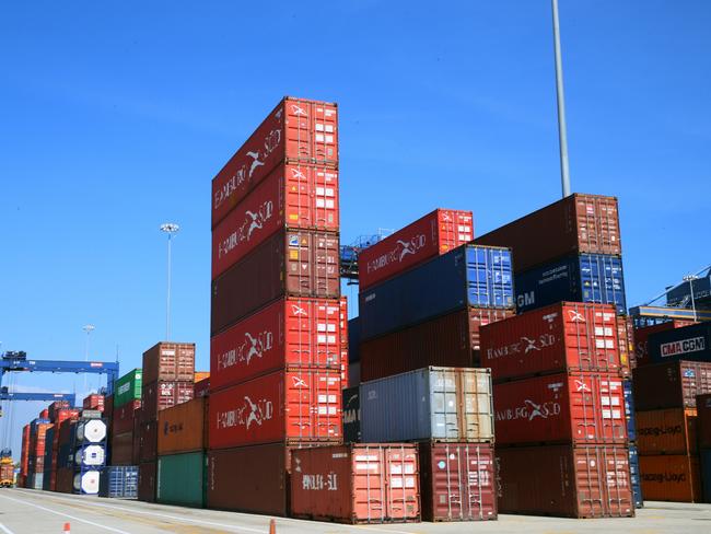 Officers stationed at Cartagena wharves work to intercept cocaine hidden in large sea containers and on ships. Picture: Gary Ramage